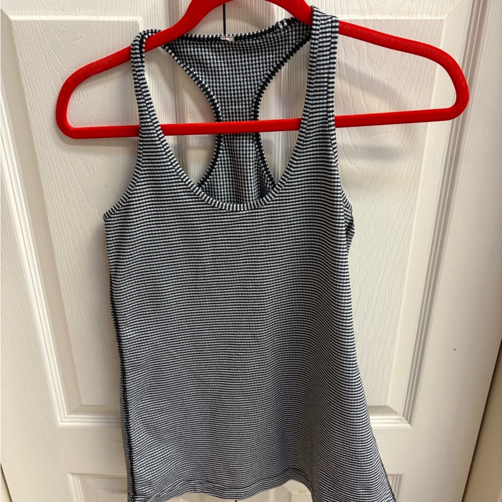 3 Lululemons Athletica Black and White Checkered Razor Tank Top and 2 white